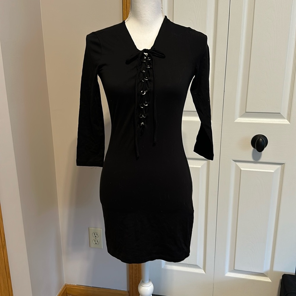 Forever 21 black body con dress size small with lace up front NWT